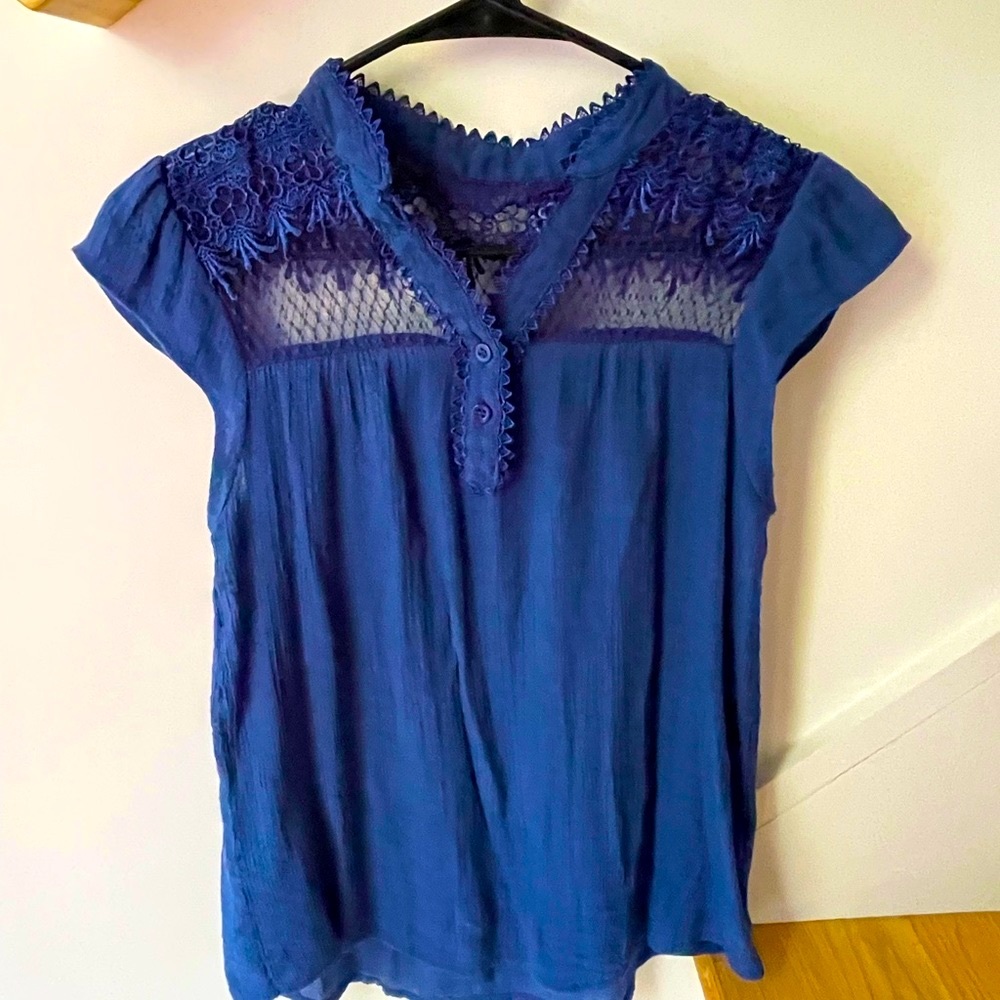 Sweet Wanderer navy blue soft blouse with mesh and appliqué shoulder accent